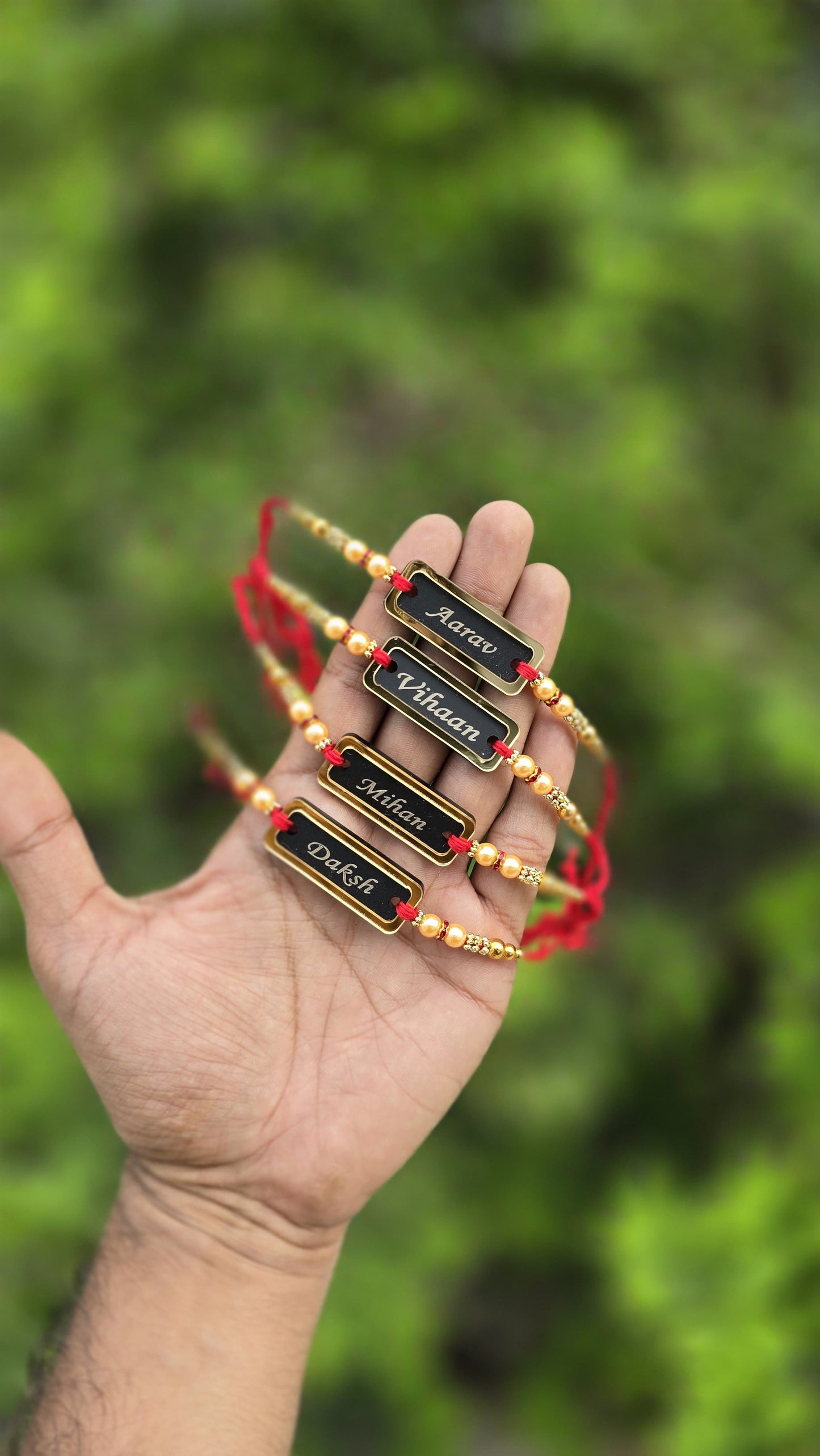 Personalized Acrylic Name Rakhi – Black & Gold Edition