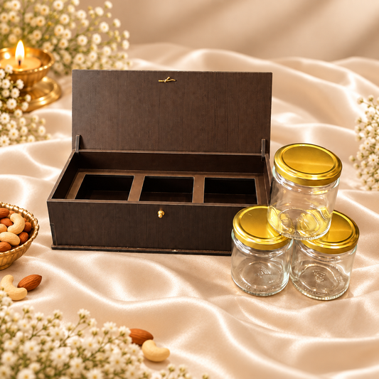Horizontal Prelam MDF Diwali Box – 3 Glass Jars (100gm) – primary view on cream satin background